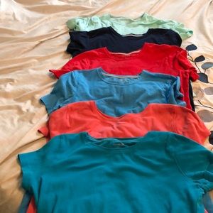 Six solid tee shirts.